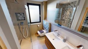 Un baño de Ocean House Freiheit 21 fotos más