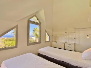 Ένα ή περισσότερα κρεβάτια σε δωμάτιο στο Villa Stella Bianca