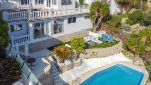 The swimming pool at or close to Zen Villa by Hello Homes Sitges