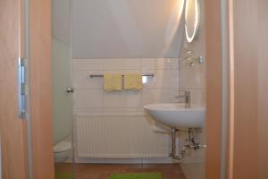 Koupelna v ubytování Gästehaus Bachmann + 33 fotografií