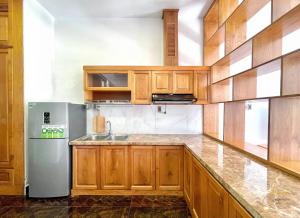 Kuchyň nebo kuchyňský kout v ubytování Kim Minh Apartment & Hotel