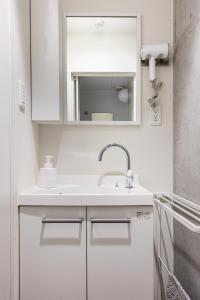 Kamar mandi di 原田屋Hotel 4F