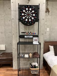 Tempat tidur dalam kamar di 原田屋Hotel 4F
