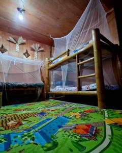 Vuode tai vuoteita majoituspaikassa J Travel Trail Inn in Hubangon, Mahinog, Camiguin