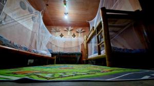 Vuode tai vuoteita majoituspaikassa J Travel Trail Inn in Hubangon, Mahinog, Camiguin