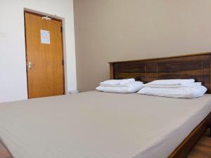 Uma cama ou camas num quarto em Havelock City Hostel, Colombo