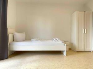 Postel nebo postele na pokoji v ubytování STA1115 gut geschnittene Monteurwohnung mit Balkon + 1 fotografie
