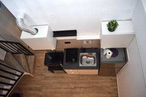 Kuchyň nebo kuchyňský kout v ubytování MALUX Aegean Maisonettes