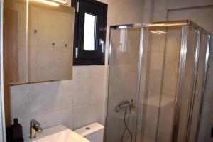 Koupelna v ubytování MALUX Aegean Maisonettes
