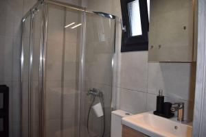 Koupelna v ubytování MALUX Aegean Maisonettes