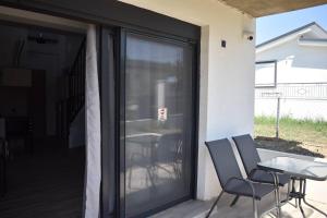 Patio nebo venkovní prostory v ubytování MALUX Aegean Maisonettes