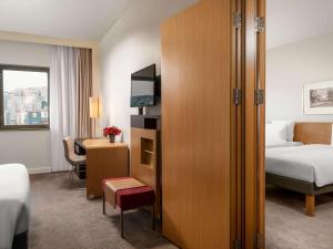 Postel nebo postele na pokoji v ubytování Novotel Trabzon