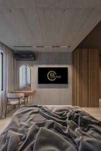 Una cama o camas en una habitación de Open Space