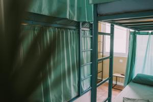 Postel nebo postele na pokoji v ubytování Kite & Surf Nomad House