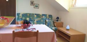 Ένα ή περισσότερα κρεβάτια σε δωμάτιο στο Apartments Vita Center