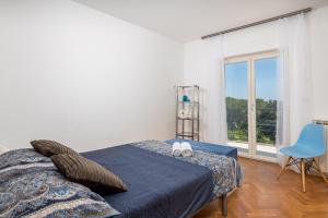 Postel nebo postele na pokoji v ubytování Vila Lux 1 + 27 fotografií