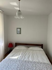 Ένα ή περισσότερα κρεβάτια σε δωμάτιο στο Village 4 double bed home +3 φωτογραφίες