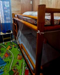 Katil atau katil-katil dalam bilik di J Travel Trail Inn- Bed Space in Hubangon, Mahinog, Camiguin