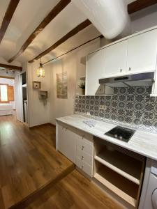 Køkken eller tekøkken på FRAY POSIDONIO HappyVila + 14 billeder