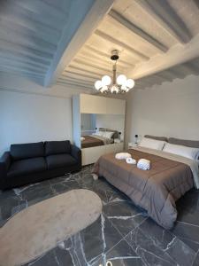 Postel nebo postele na pokoji v ubytování REALE B&b EMPOLI