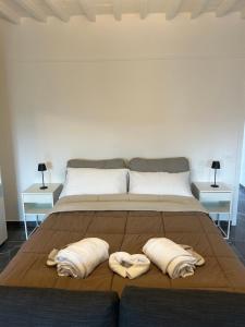 Postel nebo postele na pokoji v ubytování REALE B&b EMPOLI