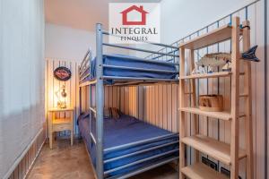 Ένα ή περισσότερα κρεβάτια σε δωμάτιο στο La Goleta de Palamós