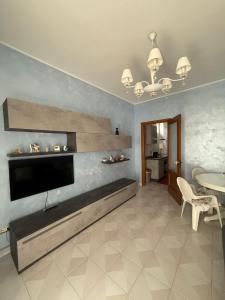 TV a/nebo společenská místnost v ubytování Casa Vacanze Da Linda