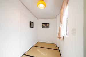 Postel nebo postele na pokoji v ubytování 上海小胖纸民宿-南京西路1店-静安别墅