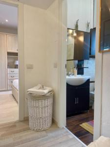 a small kitchen with a sink and a bathroom at Bnbook Martina's house in Castelletto sopra Ticino +47 photos