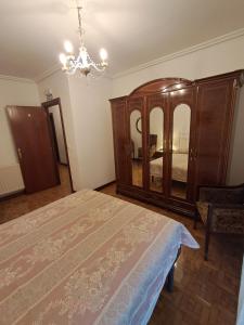 Postel nebo postele na pokoji v ubytování ALBERGUE CASA ARQUEÑA sólo peregrinos con credenciales