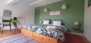 Postel nebo postele na pokoji v ubytování A-Típica GuestHouse