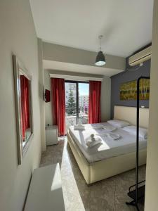Postel nebo postele na pokoji v ubytování Privé City Hotel