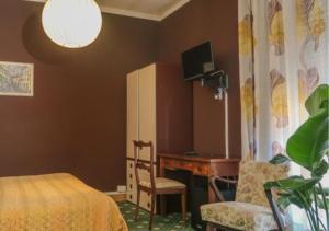 TV a/nebo společenská místnost v ubytování Bridge Hotel