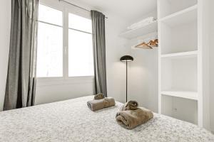 Posteľ alebo postele v izbe v ubytovaní Appartement proximité Place des Lices avec parking
