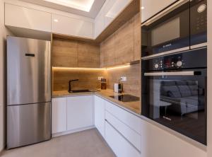 Η κουζίνα ή μικρή κουζίνα στο Adriatic Island Sea View Apartments