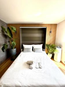 Posteľ alebo postele v izbe v ubytovaní Apartament Kamień i Morze