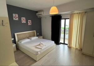 Postel nebo postele na pokoji v ubytování Privé City Hotel