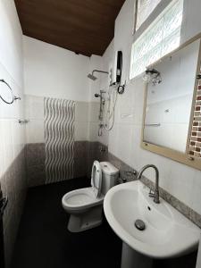 Koupelna v ubytování Home Living Unit