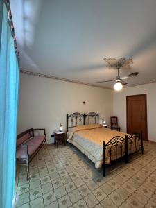 Ένα ή περισσότερα κρεβάτια σε δωμάτιο στο Bed and Breakfast della Palma