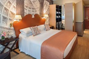 Letto o letti in una camera di Starhotels Michelangelo Rome