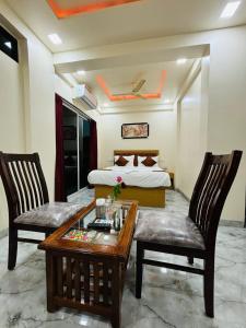Hotel Fun Suite- Baner Hill客房内的一张或多张床位