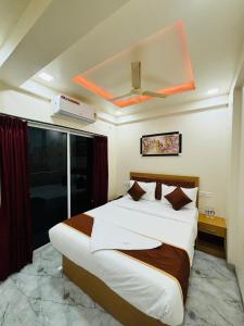 Hotel Fun Suite- Baner Hill客房内的一张或多张床位