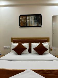 Hotel Fun Suite- Baner Hill客房内的一张或多张床位