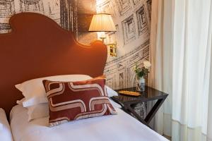 Letto o letti in una camera di Starhotels Michelangelo Rome