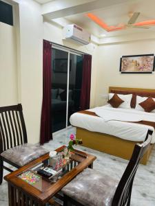 Hotel Fun Suite- Baner Hill客房内的一张或多张床位