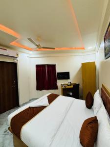 Hotel Fun Suite- Baner Hill客房内的一张或多张床位
