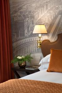 Letto o letti in una camera di Starhotels Michelangelo Rome