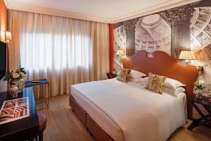 Letto o letti in una camera di Starhotels Michelangelo Rome