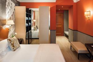 Letto o letti in una camera di Starhotels Michelangelo Rome