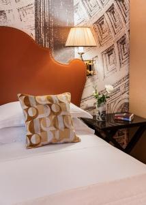 Letto o letti in una camera di Starhotels Michelangelo Rome